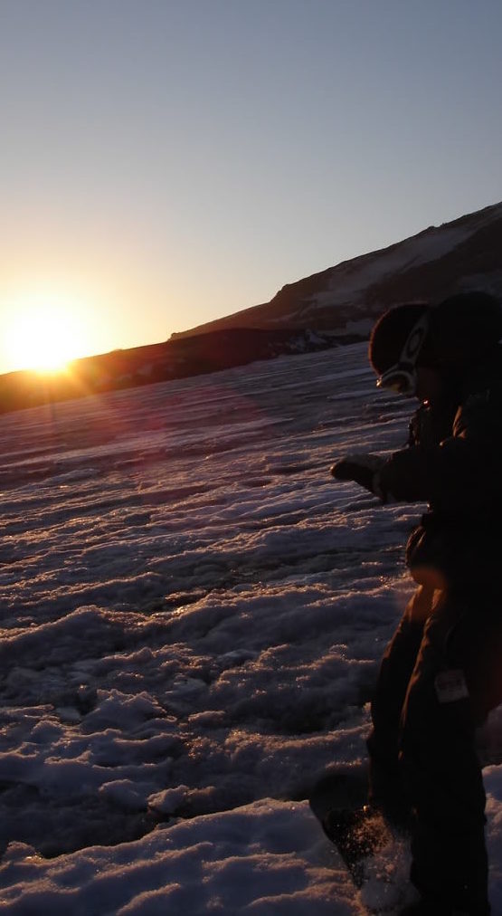 Snowboarding the Muir Snowfield in late fall Mount Rainier