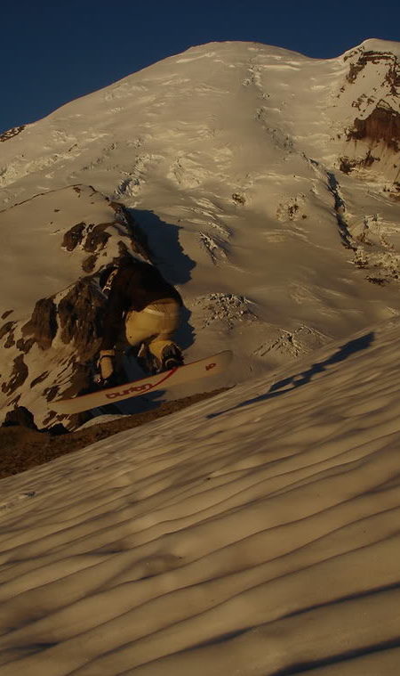 Snowboarding to the sunrise in Mount Rainier National Park