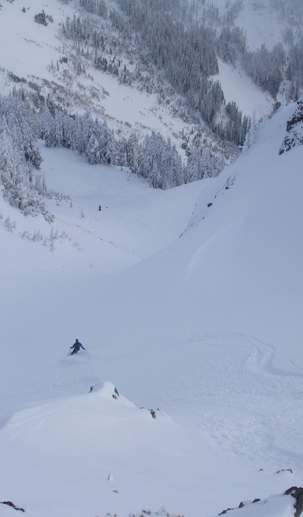 Skiing off Castle Peak in Mount Rainier National Park