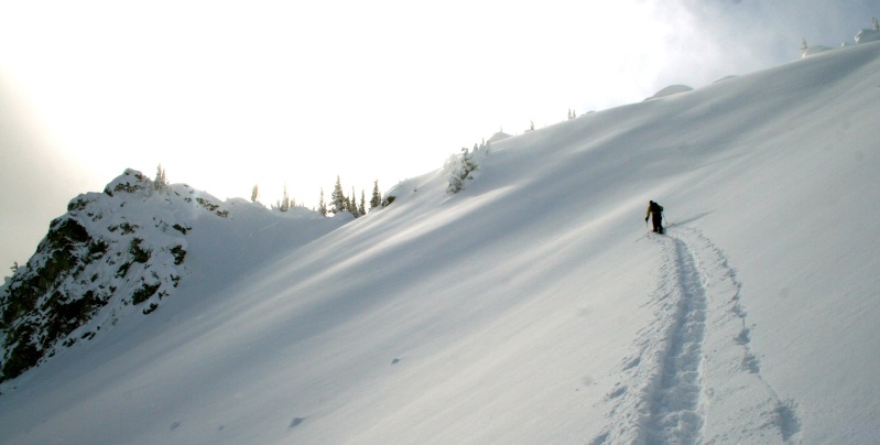 Breaking trail up to the low saddle of Silver Basin in the Crystal Mountain Backcountry
