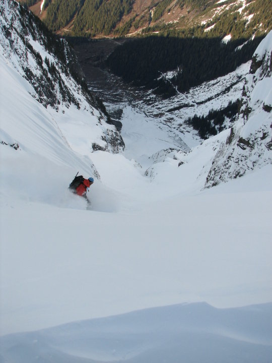 Snowboarding down the CJ Couloir