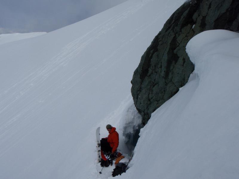 Preparing to snowboard down the Pride Glacier