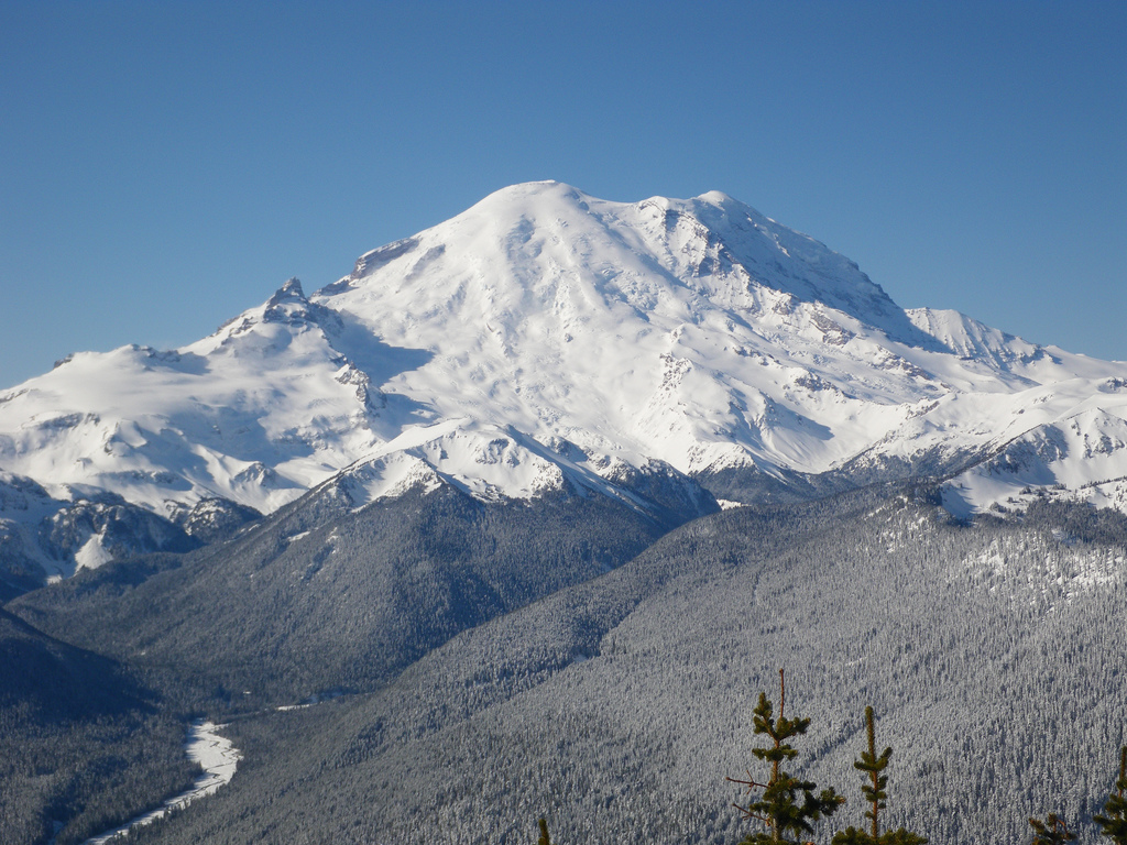 A partial view of the northeast side of Rainier from Crystal Mountain, the Interglacier is the prominent pyramid on the right