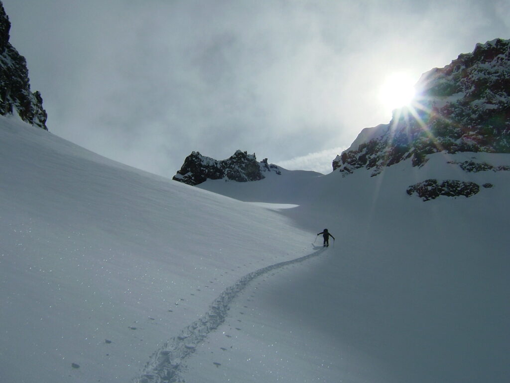 Breaking trail up the Sarvant Glacier