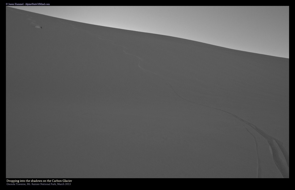 Snowboarding down the Carbon Glacier in Mount Rainier National Park during the Osceola Traverse