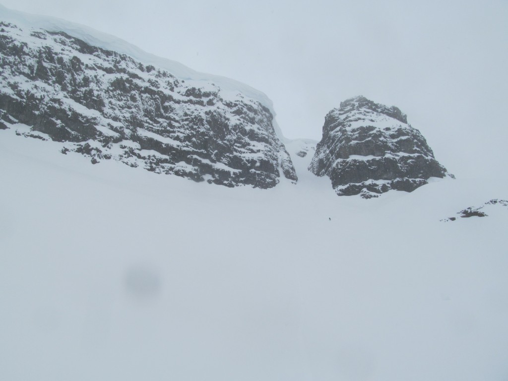 Boot riding the apron of the Banshee Couloir