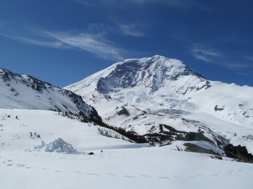 Looking at Rainier from camp. I used my snow debris as a beacon for easy spotting in the alpine during the Paradise to Carbon River ski traverse