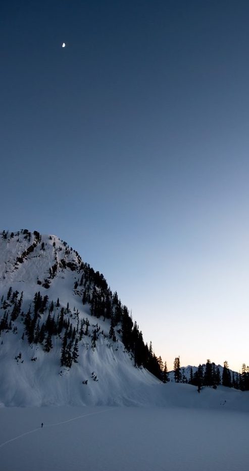 Ski touring across Twin Lakes in the Monte Cristo