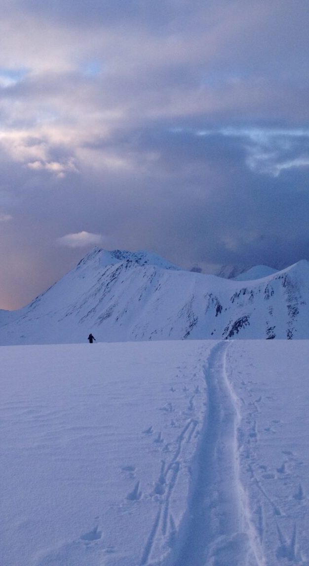 Snowboarding in the Kvalvikdalen Backcountry of Norway