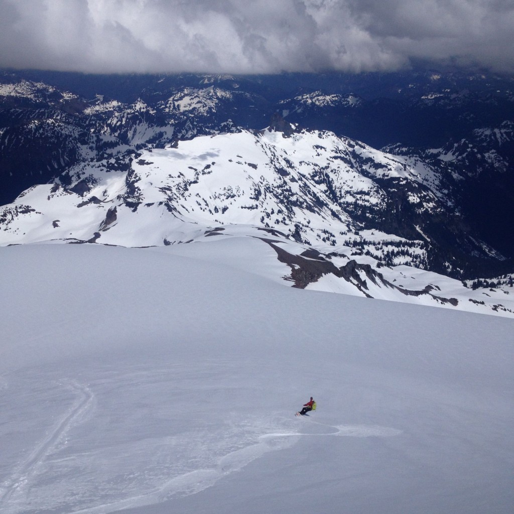 Ben snowboarding down the East face of Whitman Crest towards Ohanapecosh 