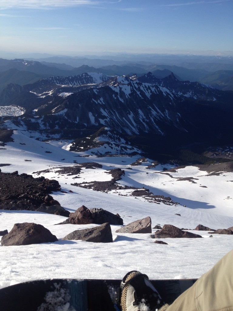 Preparing to snowboard towards Mystic Lake while ski touring along the Wonderland Trail