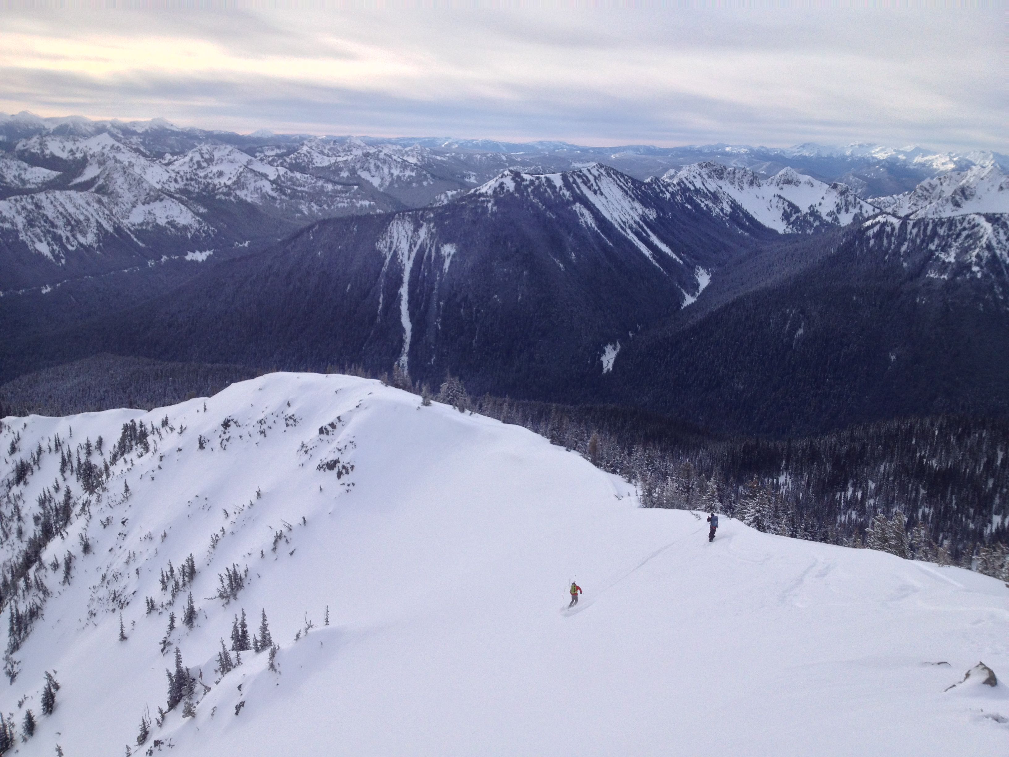 Snowboarding into the NE face of Dege Peak