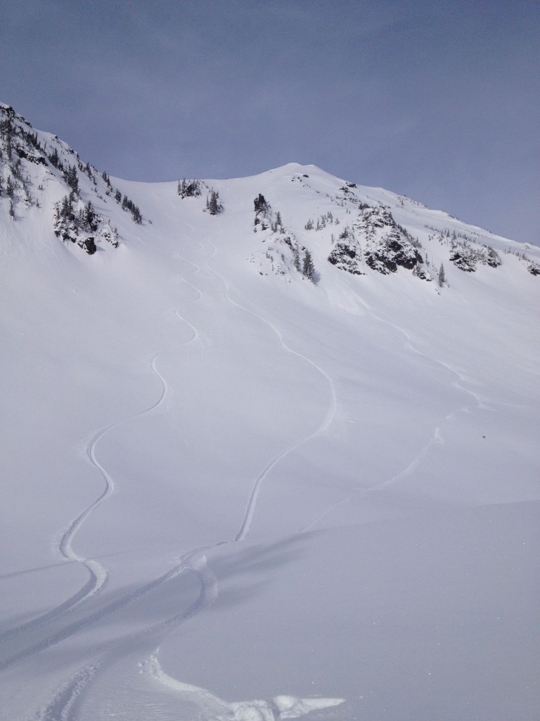 Looking up at our snowboard tracks on Dege Peak