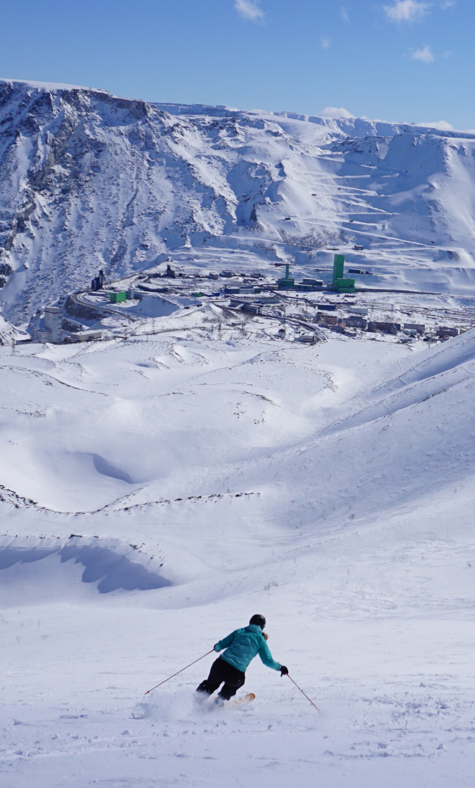 Skiing down the wide open slopes on Kukisvumchorr in the Khibiny Mountains of Russia