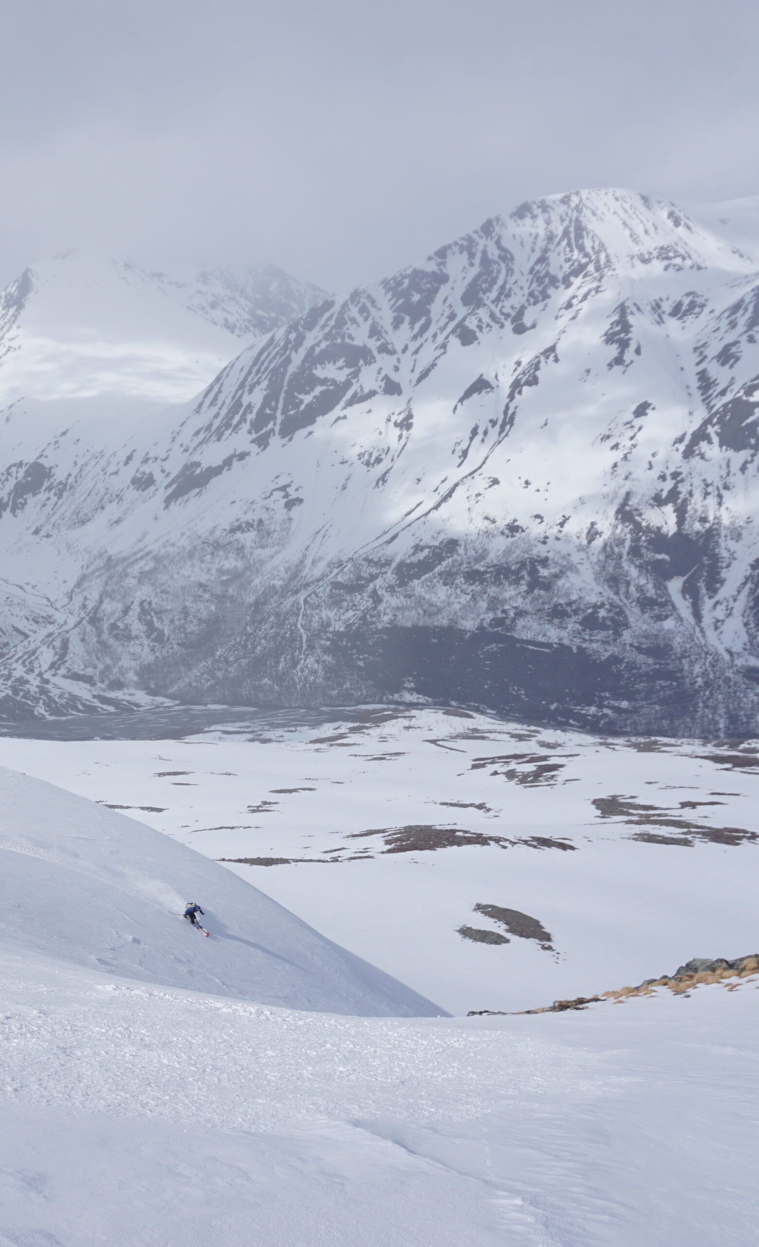 Making powder turns down the Northwest bowl of Daltinden in the Lyngen Alps of Norway