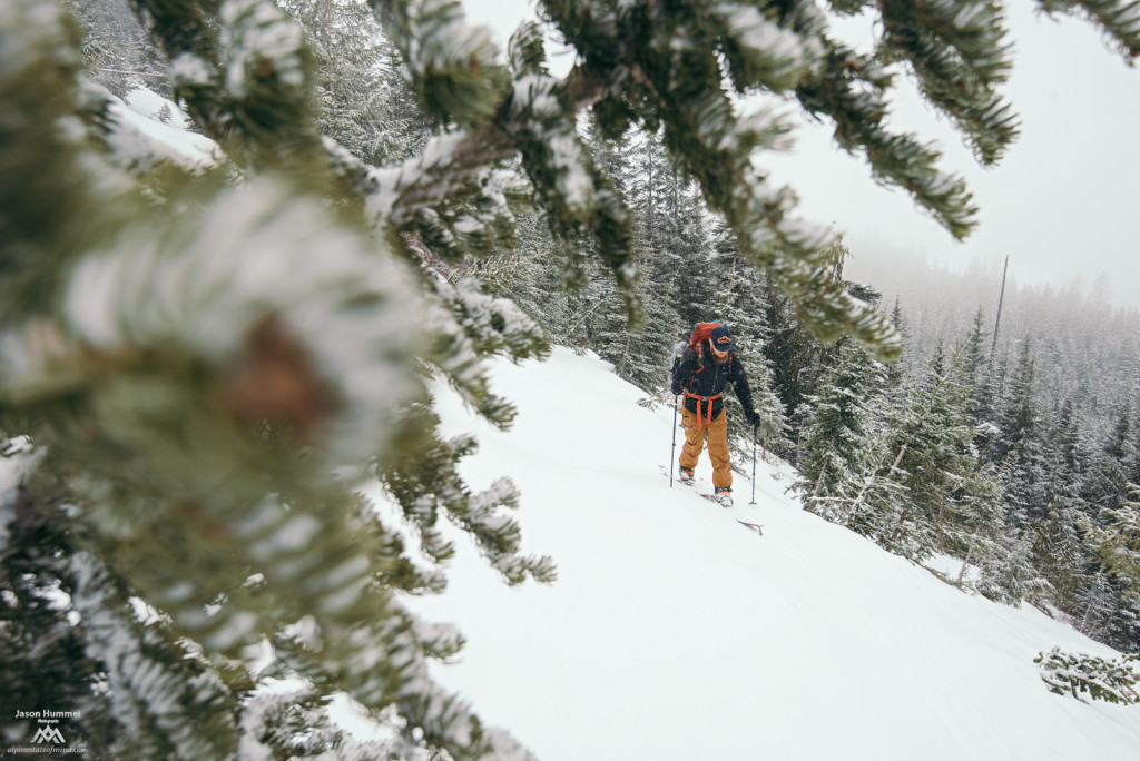 A cold day climbing up East Peak during the Crystal Mountain to Stampede Pass Ski Traverse