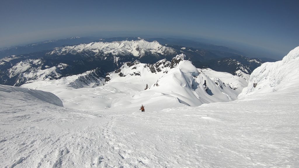 The final steps before arriving on the summit of Mount Baker