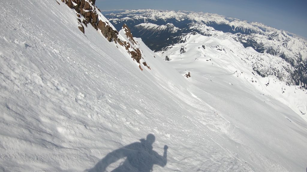 Snowboarding down the Park Glacier on Mount Baker while doing the Watson Traverse