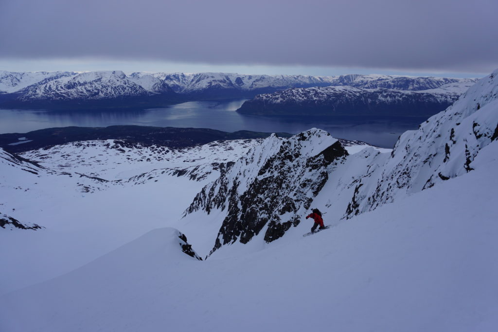 Riding off the sumit of Store Kjostinden