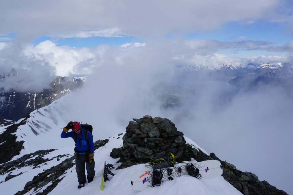 Waiting on the summit of Goalsevarri to snowboard down the west face