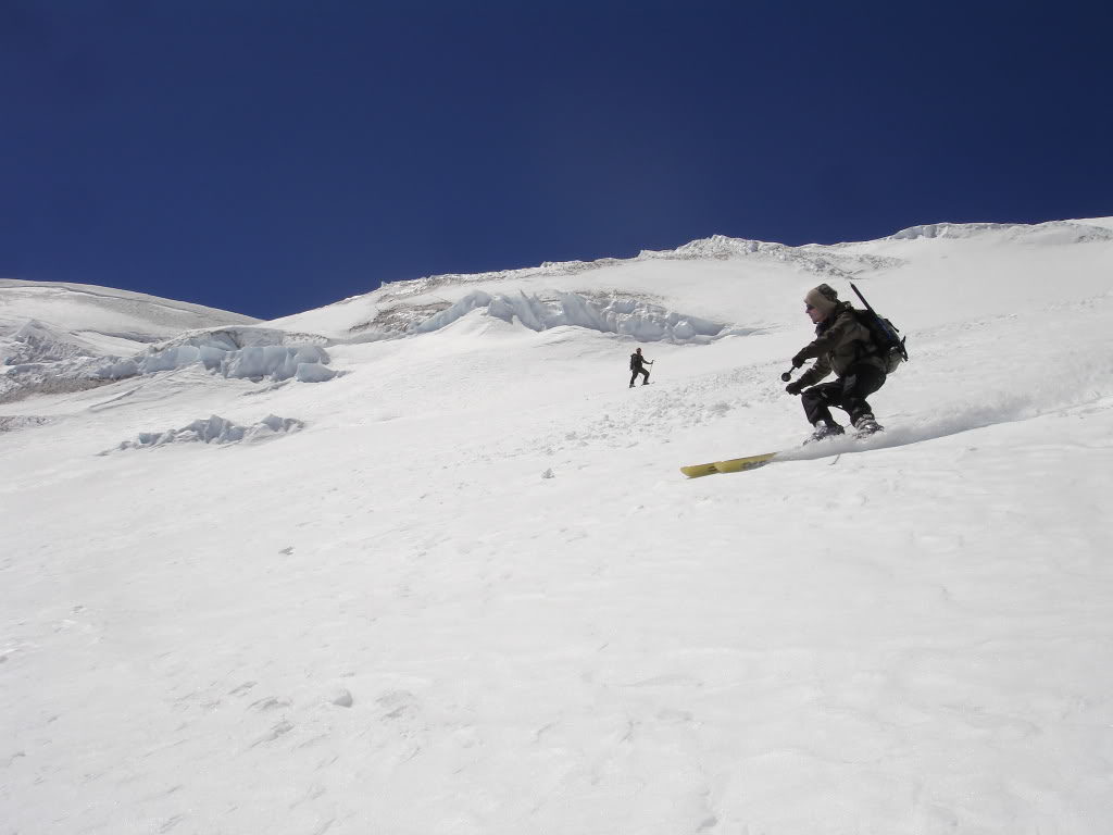 Skiing down the upper Wilson Glacier  towards the Fuhrer Thumb in Mount Rainier National Park