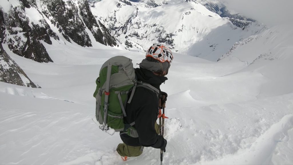 About to snowboarding into the Nooksack Cirque while on the Nooksack Traverse