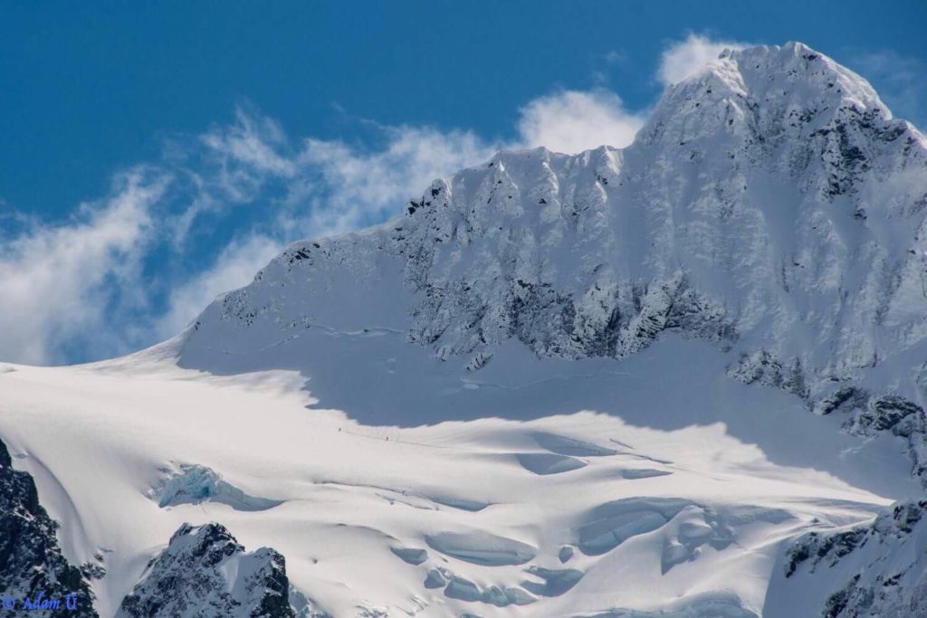 Breaking trail across the Hanging Glacier while on the Nooksack Traverse