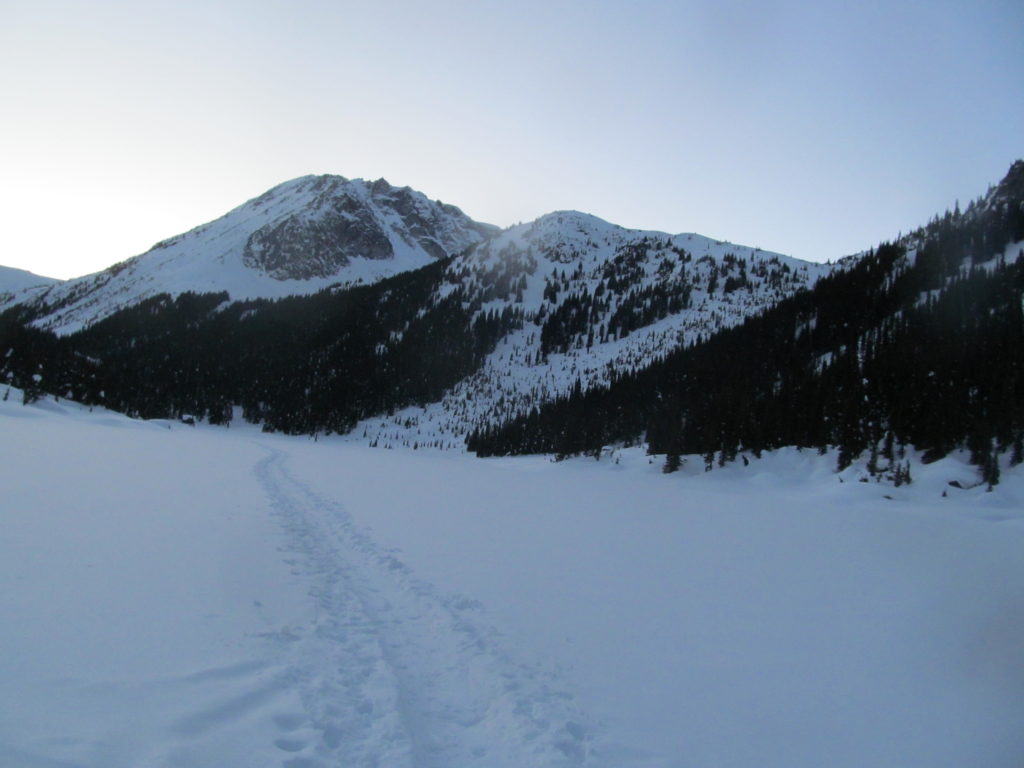 Skinning across Long Lake to the Brian Waddington Hut