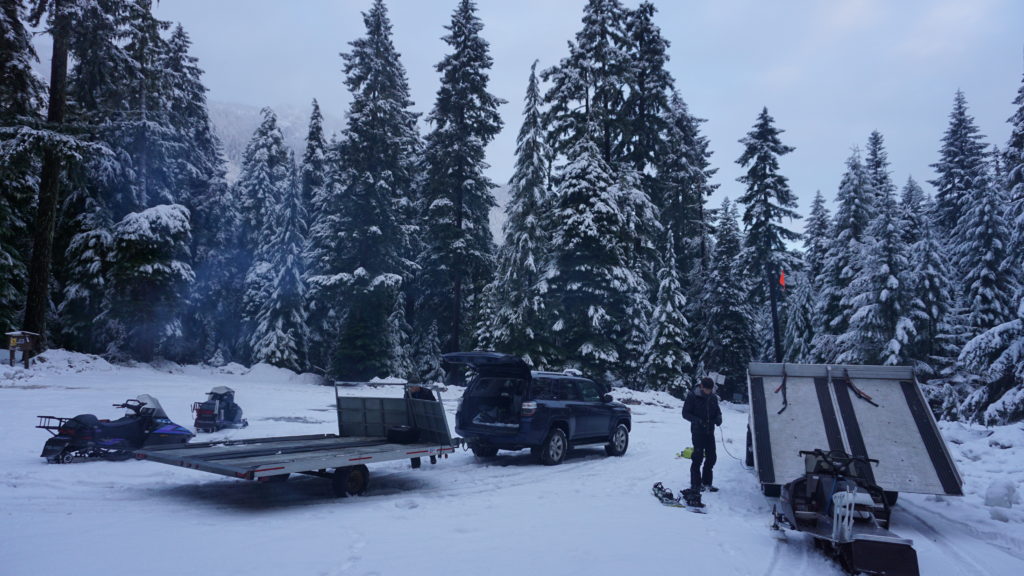 Getting the snowmobiles ready in the White River Snowpark