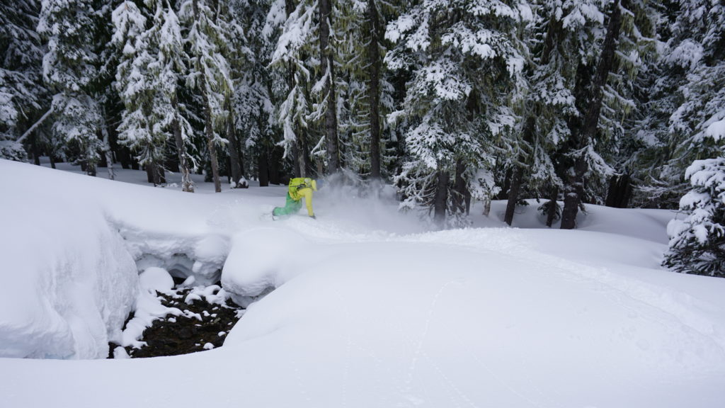 Snowboarding back down to our skin track