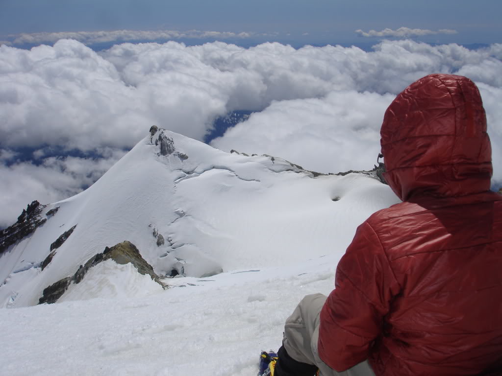 Looking towards Sherman Peak and taking a rest on the summit of Mount Baker