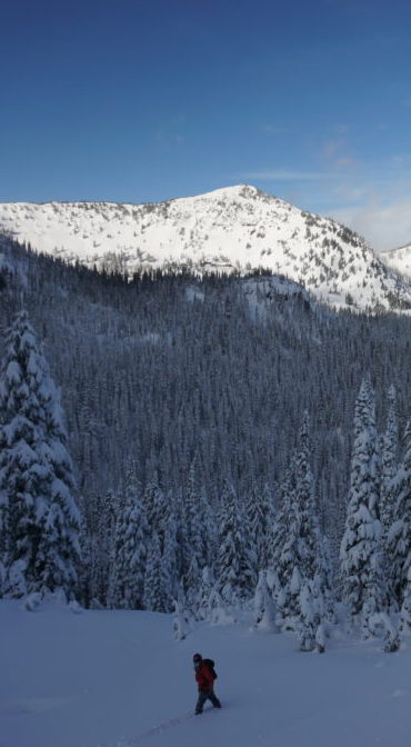 Snowboarding down Gunbarrel in the Crystal Mountain Backcountry