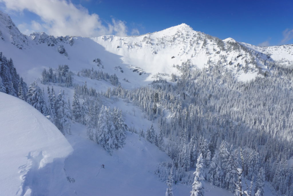 Ben skinning up Gunbarrel with the King and Silver Basin the the Background