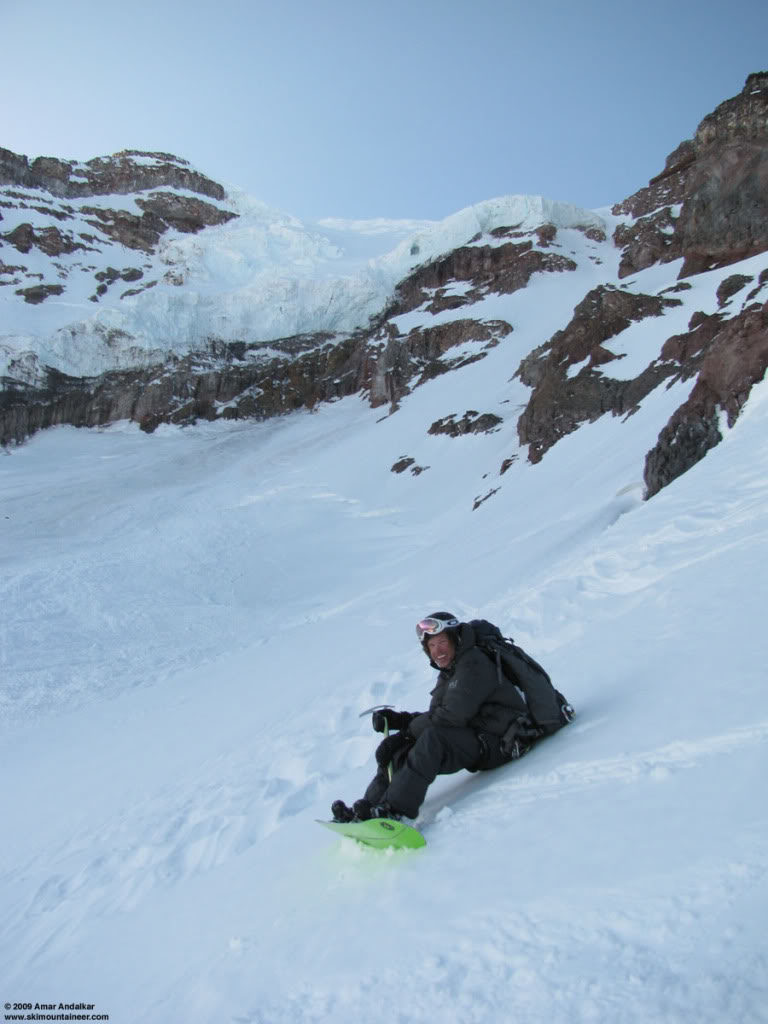 A moment of rest after snowboarding the Gib Chute 