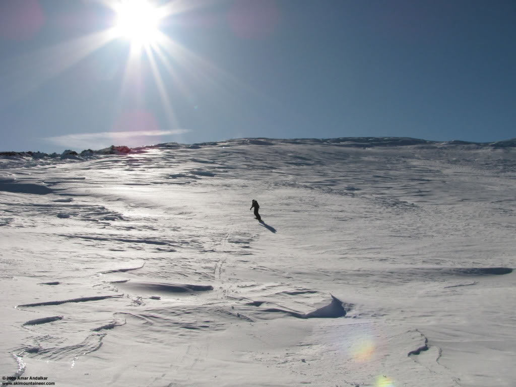 We decided to descend the Gib Chute a more direct line back to the Muir Shelter. Snowboarding in the Summit Crater 