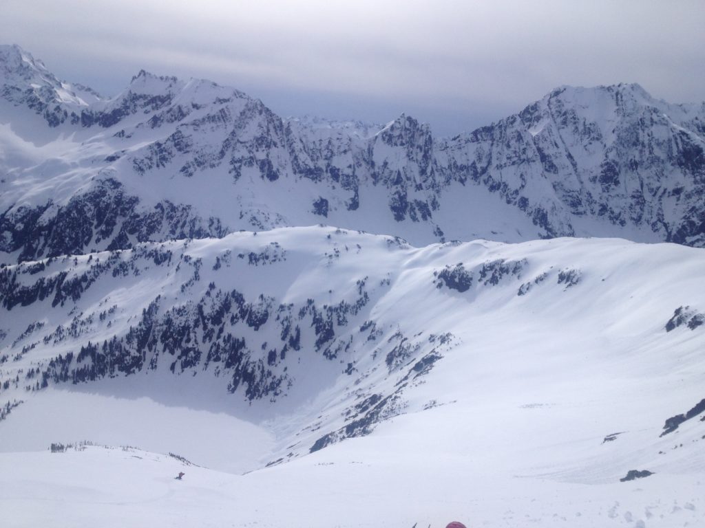 Snowboarding down the main gully of Sahale Mountain down to Doubtful Lake