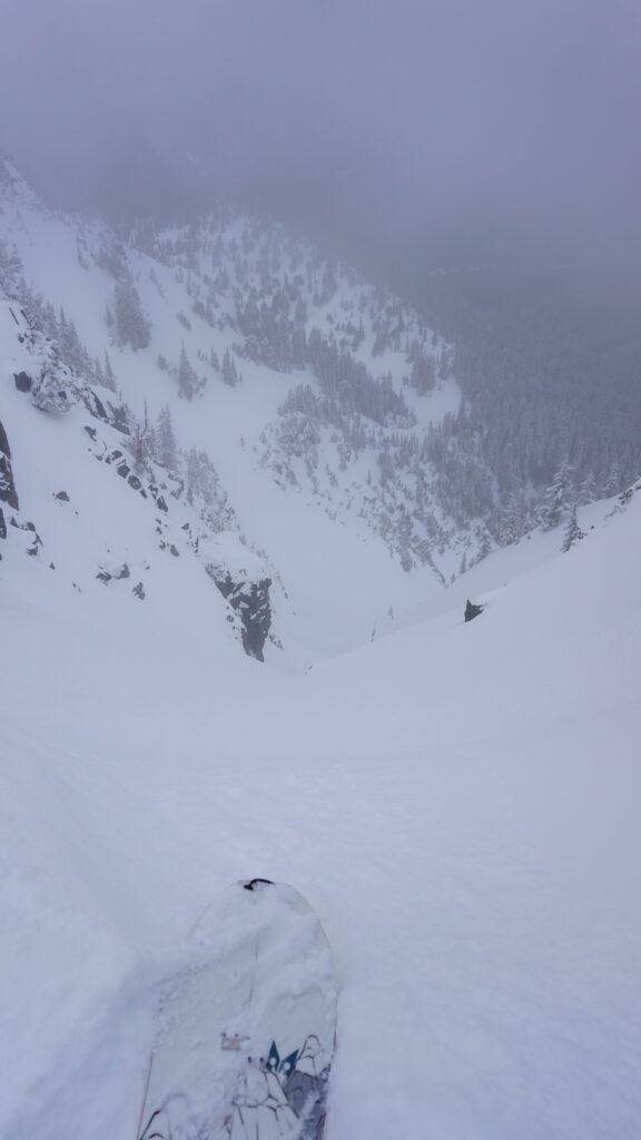 Looking down our second snowboard run on the North East face of Tamanos Mountain in Mount Rainier National Park