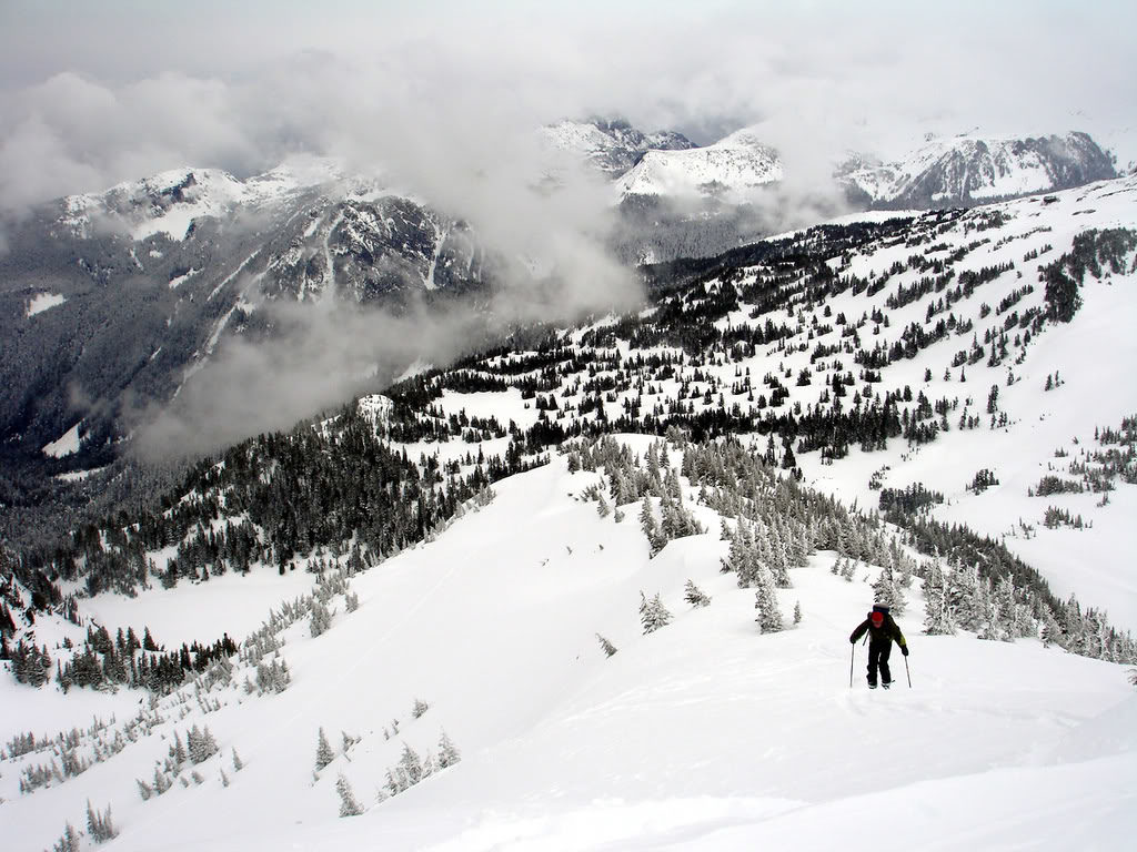 Scott hiking to the top of Mount Pleasant in Mount Rainier National Park while doing some ski Touring Around Mowich Lake