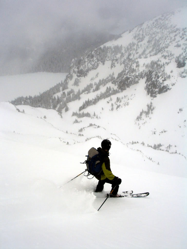 Scott skiing down Fay Peak towards Mowich Lake in Mount Rainier National Park