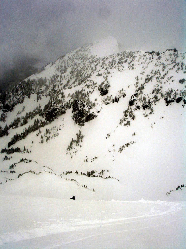 Scott enjoying the snow on Fay Peak in Mount Rainier National Park and doing some ski Touring Around Mowich Lake