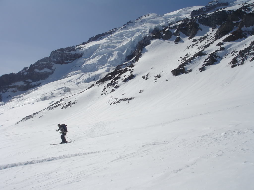 Dan Skiing down with the summit in the Background