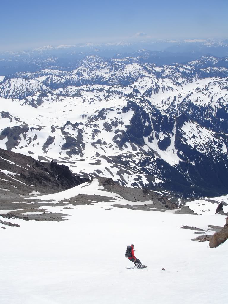 Riding down the open snow below the chute on Glacier Peak