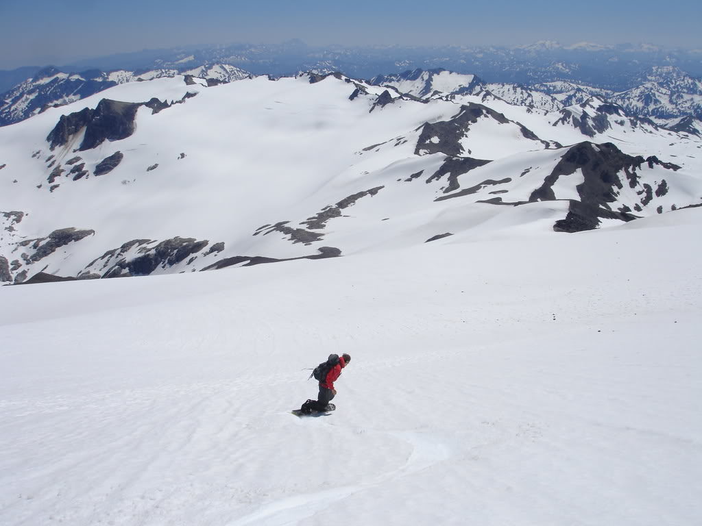 Snowboarding towards the low col