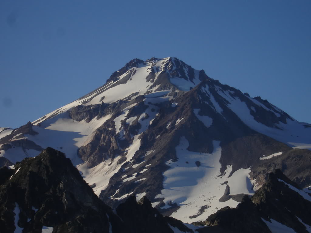 Our climbing route to the summit of Glacier Peak via the Cool Glacier in the sun, on the right side while our ski decent on the left side