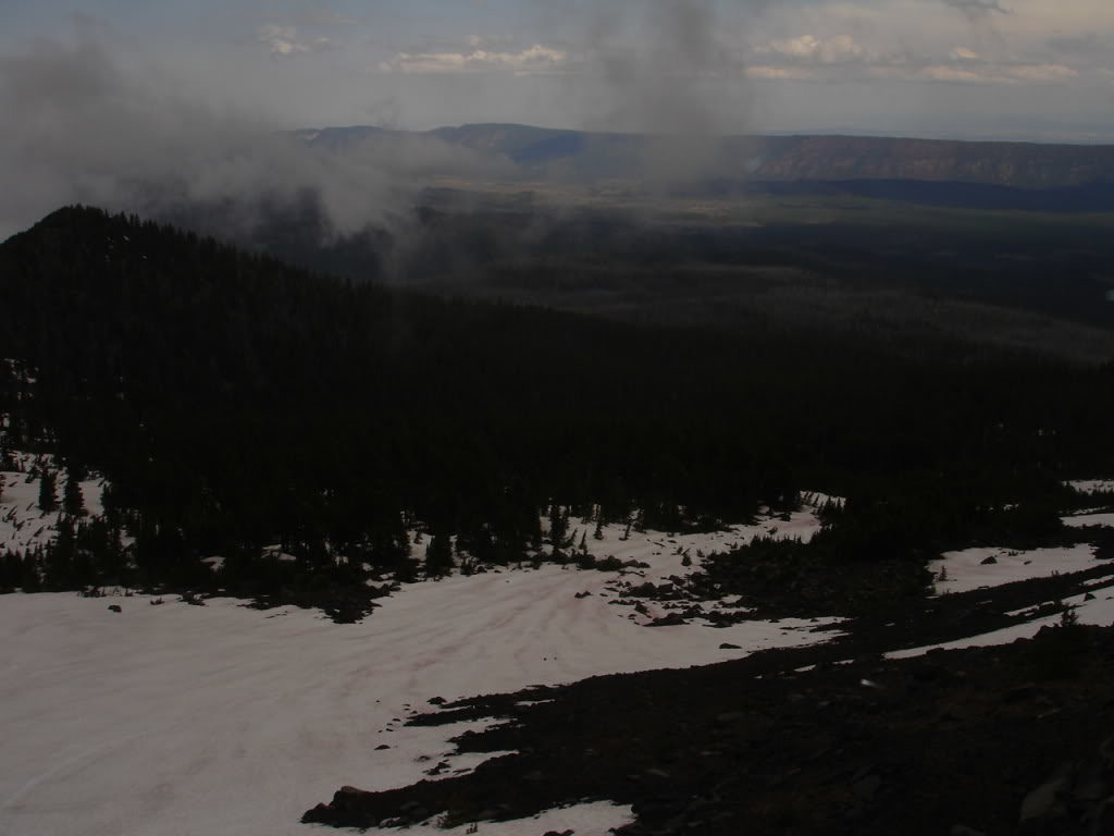 Snowboarding down the Northeast bowl of Three Fingered Jack