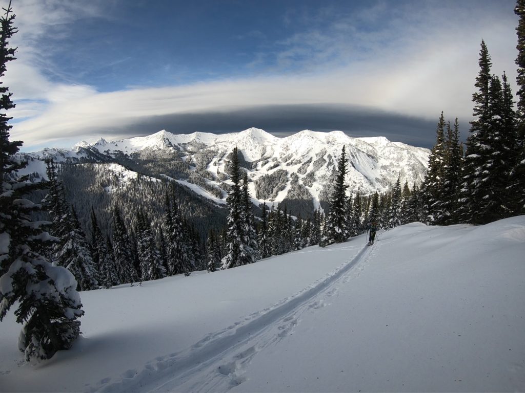 Heading out to Crown Point in the Crystal Mountain Backcountry with a stunning view of the mountain from Bullion Peak