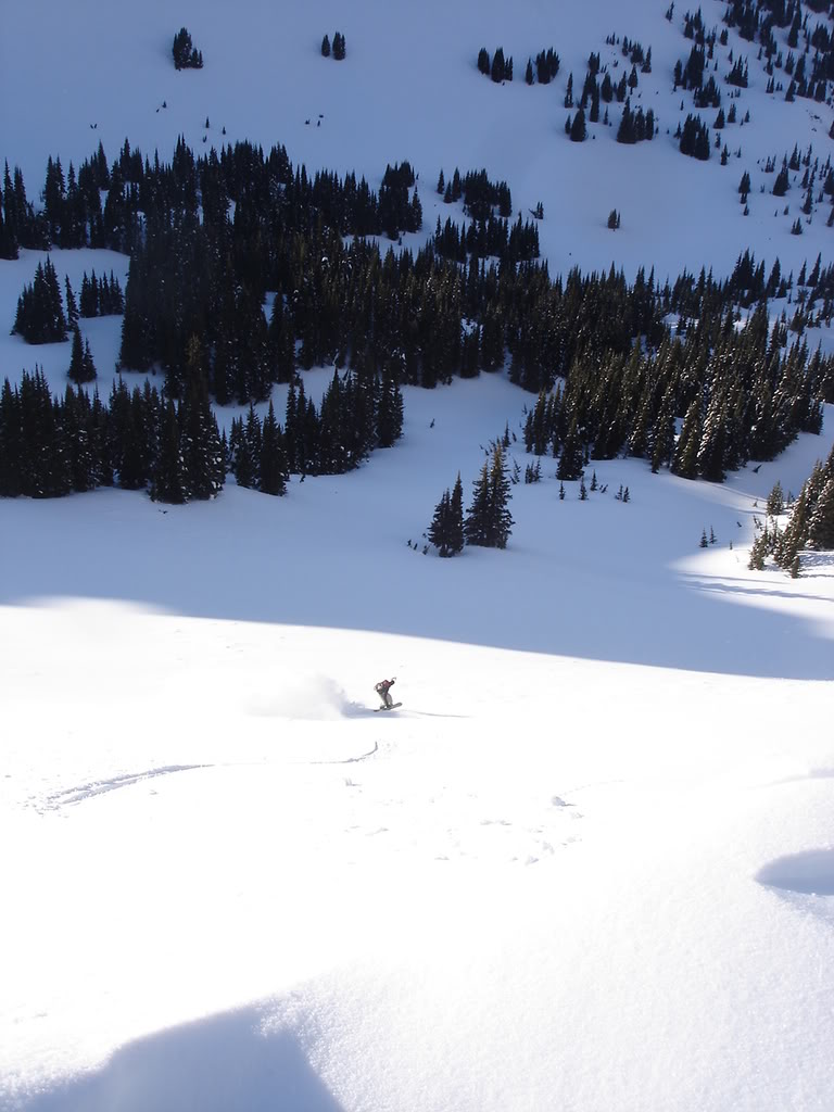 Chris Snowboarding into Big Crow Basin from Norse Peak