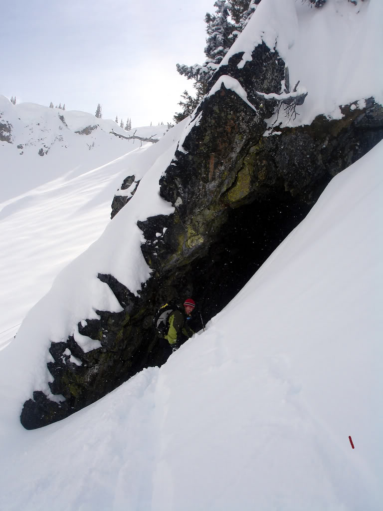 Checking out a cave on Crystal Peak