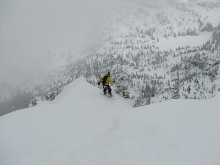 Snowboarding down the South Face of Crystal Peak