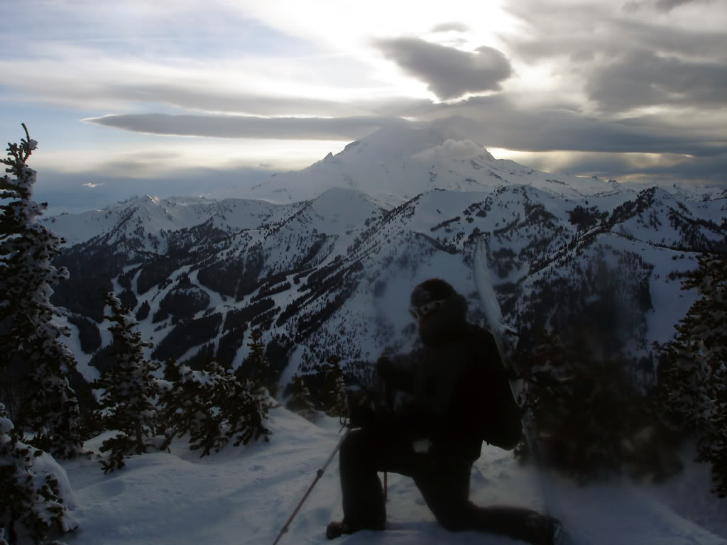 A minute of rest before our final snowboard down East Peak in the Crystal Mountain Backcountry